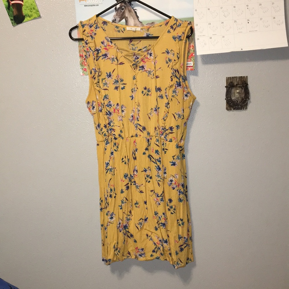 Yellow, floral dress.